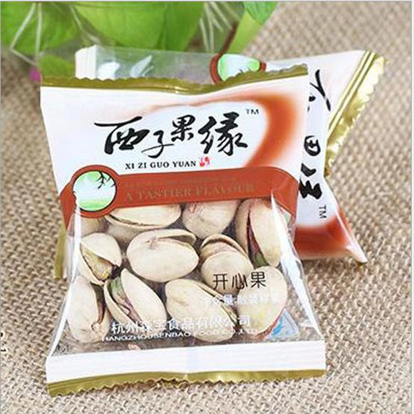 天津開心果包裝機(jī) 自動(dòng)炒貨包裝機(jī)圖片