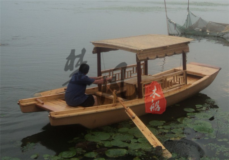 供应用于景区观光的手划木船旅游带篷木船服务类船小木船图片