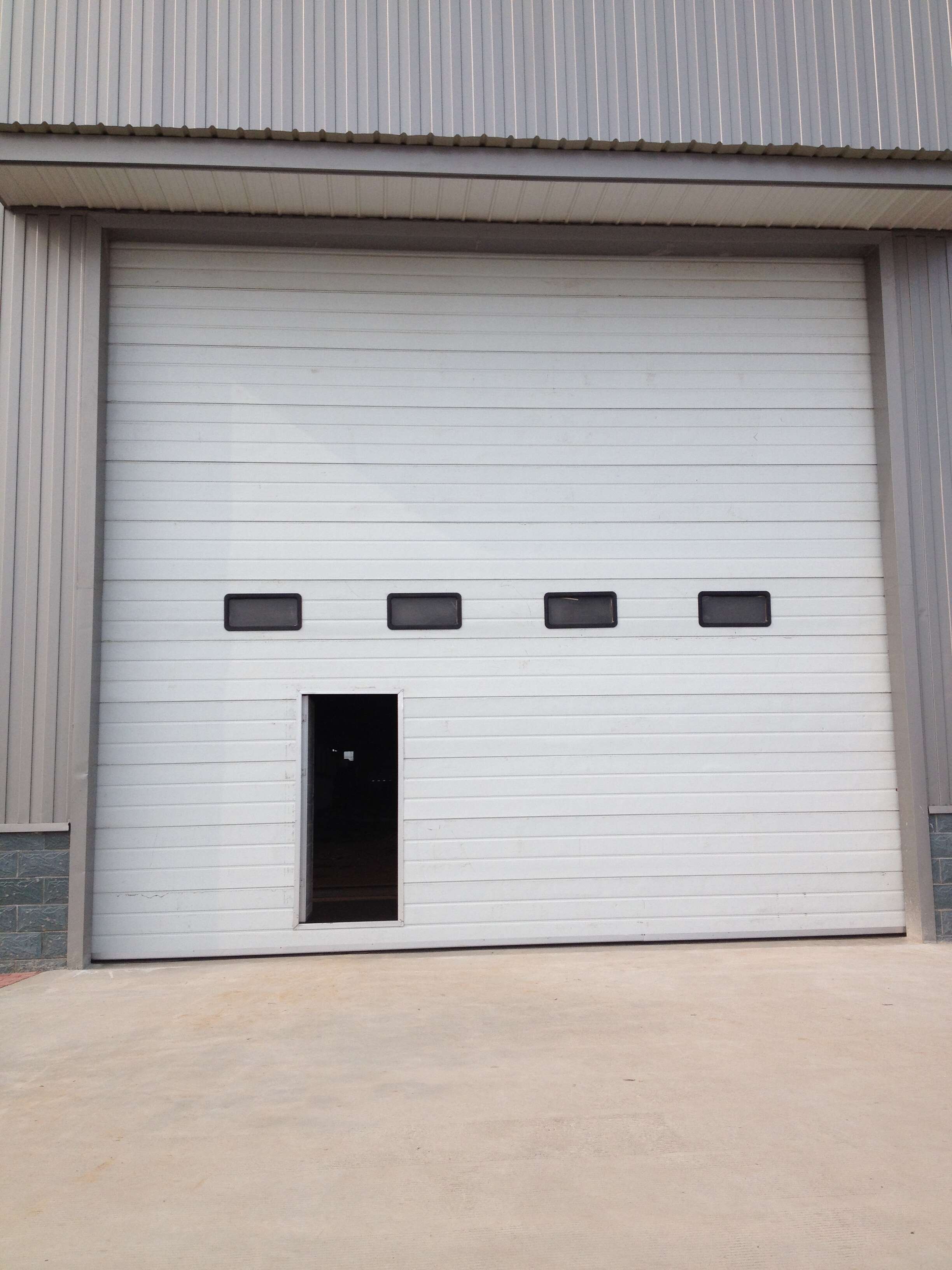 常州工業(yè)提升門價格供應工業(yè)門工業(yè)提升門廠家