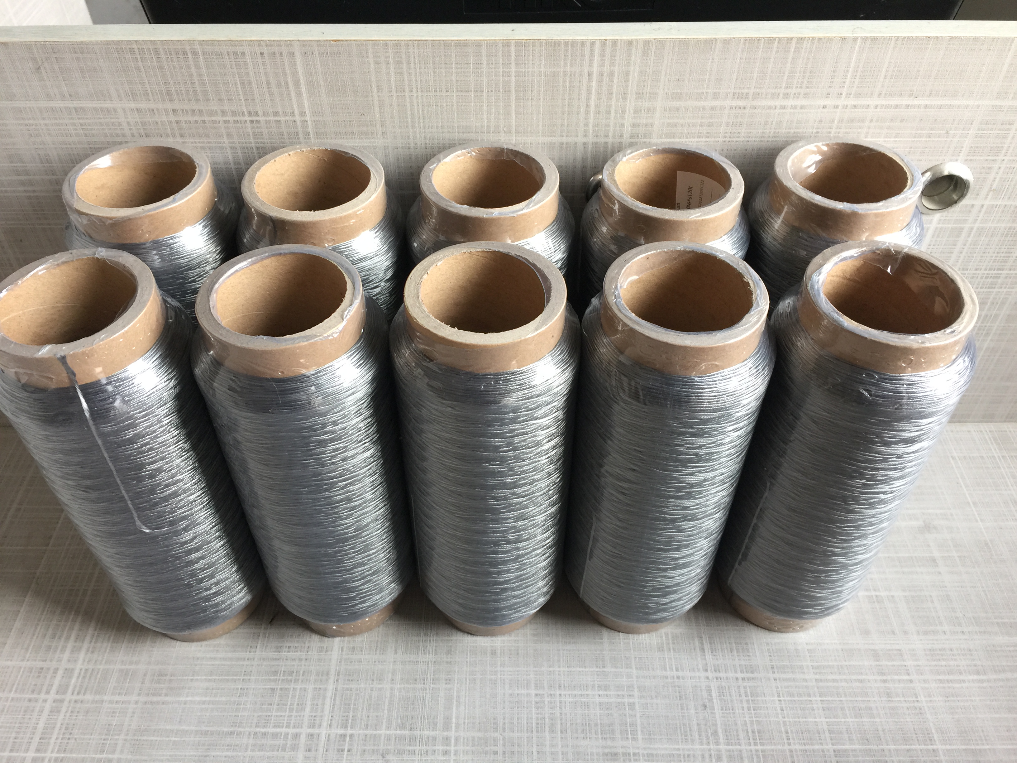 廠家供應(yīng)單捻高強(qiáng)拉力不銹鋼短纖紗線 耐磨易車縫耐高溫縫紉線金屬發(fā)熱線