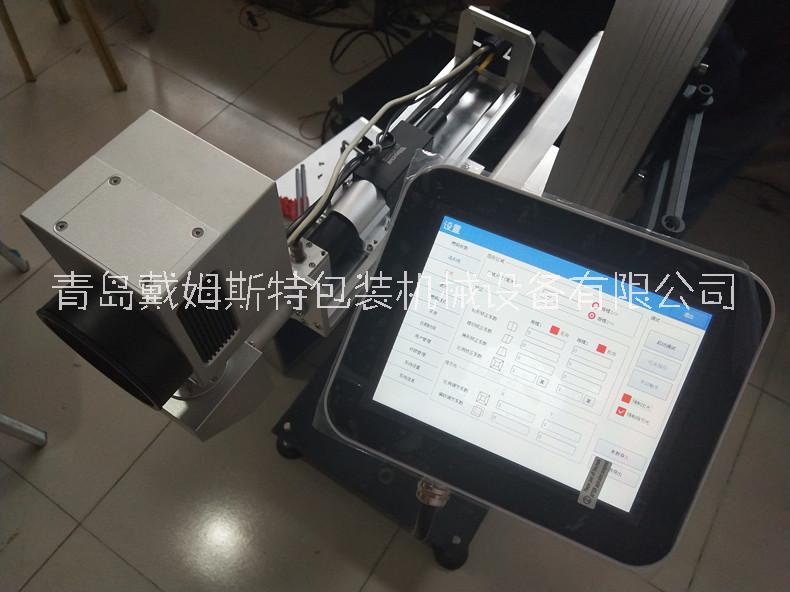 糖果巧克力激光喷码机青岛激光喷码机厂家供应糖果巧克力激光喷码机生产线日期激光打码机