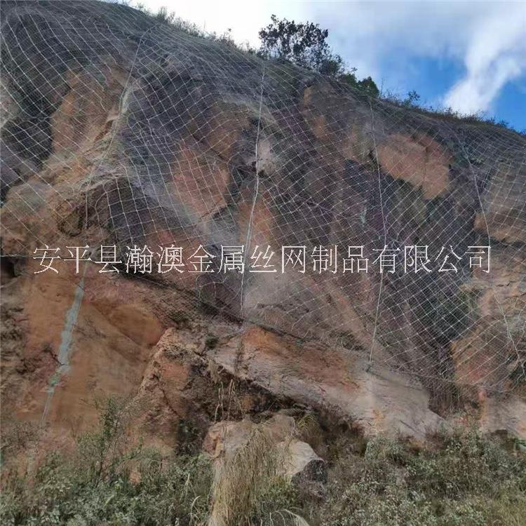 贵州兴义矿山边坡绿化防护网公路山体防滑坡落石网SNS主动防护网价格拦石被动柔性防护网