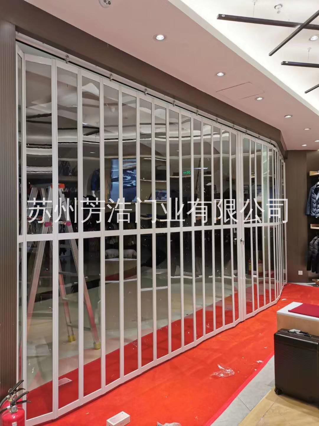 苏州铝合金折叠门 水晶折叠门 商场店铺隐形铝合金水晶折叠门图片