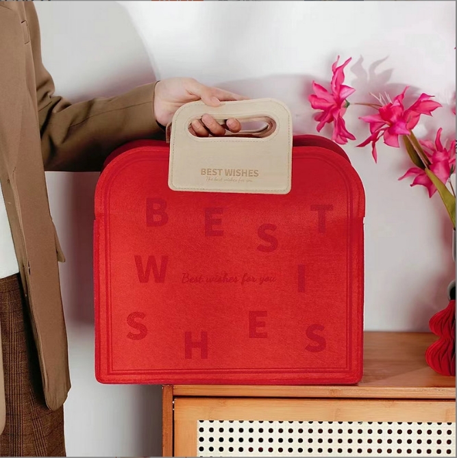 河北毛氈手提包定制 新款時尚毛氈包大容量簡約婚慶伴手禮公司福利便攜紅色毛氈手提包圖片