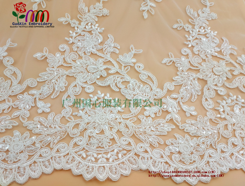 釘珠蕾絲面料婚紗禮服  廠家批發(fā) 釘珠蕾絲面料婚紗禮服 服裝服飾輔料