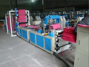 熱封冷切無紡布圍裙制袋機 *機械 一次性圍裙制袋機 圍裙機