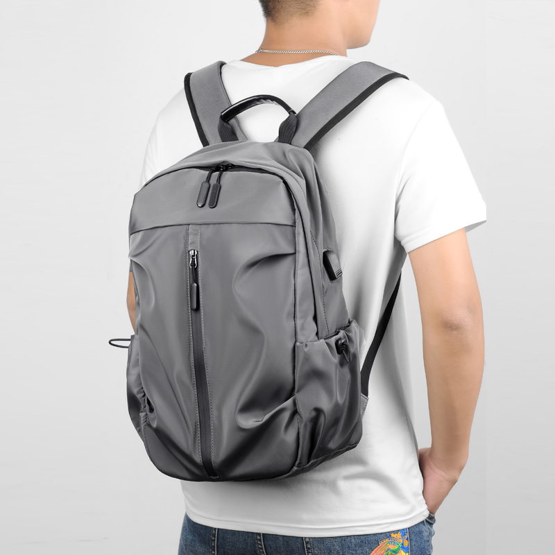 戶外休閑包時(shí)尚筆記本電腦背包大容量外出旅行包簡(jiǎn)約潮搭雙肩包